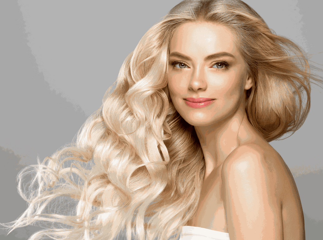 Woman with effortless beachy waves wearing wavy Syn Halo UK halo hair extensions